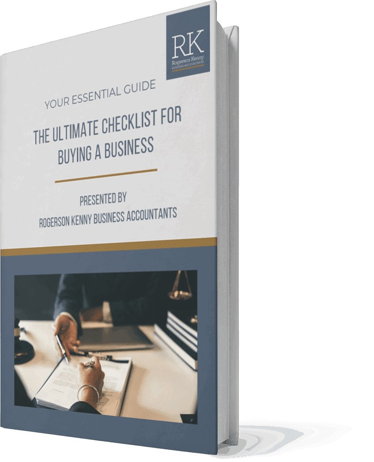 A book titled "The Ultimate Checklist for Buying a Business" by Rogerson Kenny Business Accountants, featuring a cover image of two people signing documents at a desk.